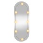 Espejo de pared ovalado con luces LED vidrio 30x70 cm en Espejos | Comprar online en Foru.es