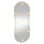 Espejo de pared ovalado con luces LED vidrio 45x100 cm en Espejos | Comprar online en Foru.es