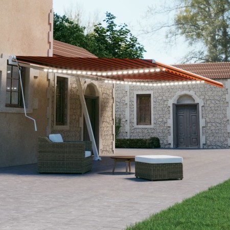 Toldo manual retráctil con luz LED naranja y marrón 600x300 cm de vidaXL, Toldos - Ref: Foro24-3069605, Precio: 658,29 €, Des...
